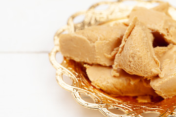 Sweet tasty arabian dessert in a bowl close up