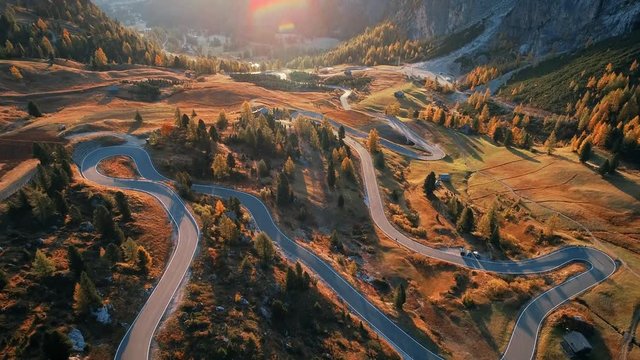Winding road aerial view 4k footage in Dolomites Italy