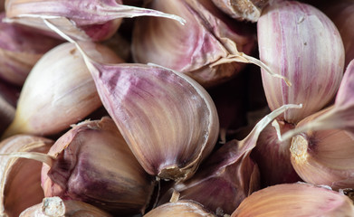 Cloves of garlic as a background
