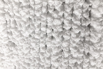 White walls of ice and snow in a cave