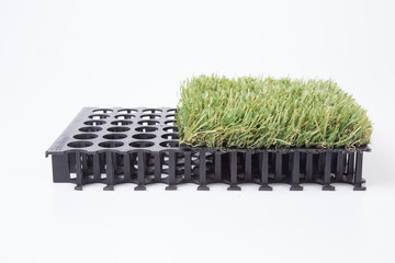 artificial grass mat isolated on a white background