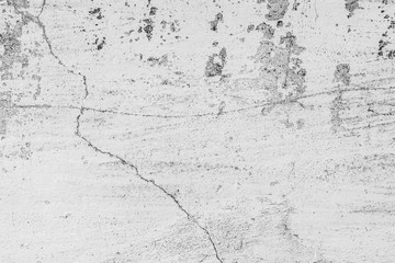 Obraz premium Texture of a concrete wall with cracks and scratches which can be used as a background