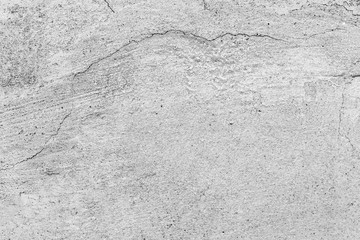 Obraz premium Texture of a concrete wall with cracks and scratches which can be used as a background