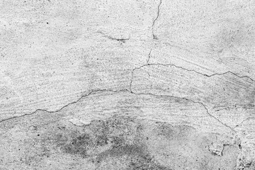 Obraz premium Texture of a concrete wall with cracks and scratches which can be used as a background
