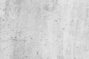 Texture of a concrete wall with cracks and scratches which can be used as a background