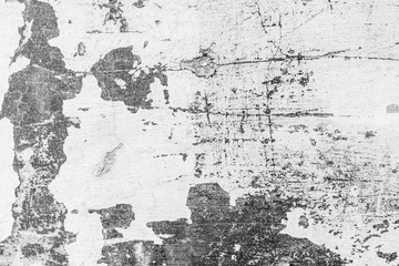 Texture of a concrete wall with cracks and scratches which can be used as a background