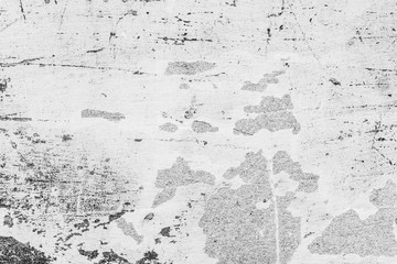 Texture of a concrete wall with cracks and scratches which can be used as a background