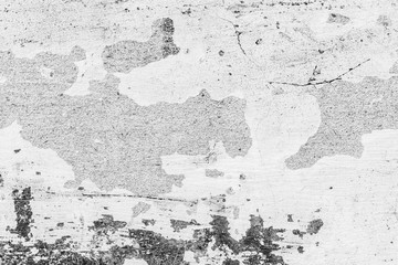 Texture of a concrete wall with cracks and scratches which can be used as a background