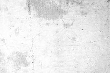 Texture of a concrete wall with cracks and scratches which can be used as a background