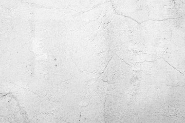 Texture of a concrete wall with cracks and scratches which can be used as a background