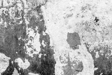 Texture of a concrete wall with cracks and scratches which can be used as a background