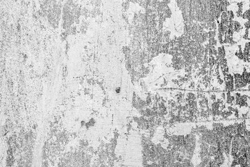 Texture of a concrete wall with cracks and scratches which can be used as a background