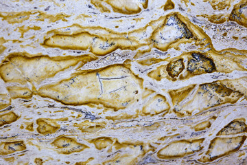 Surface of the marble with a red tint