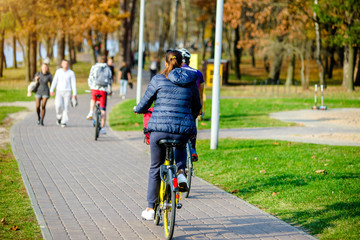 Cyclist ride on the bike path in the city Park