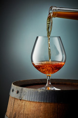 cognac pouring into glass