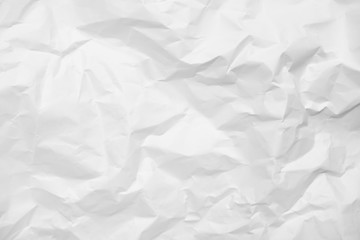 White crumpled paper texture background.