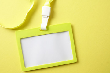 Empty ID card isolated on yellow background.