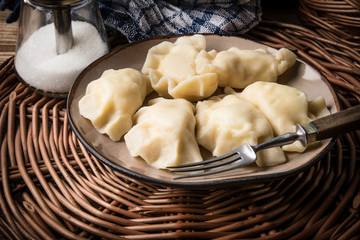 Homemade dumplings with cheese.
