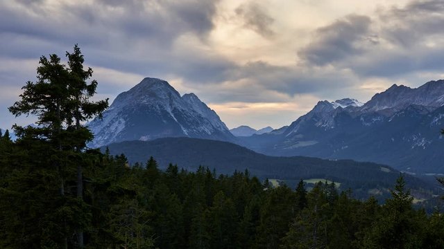 Sunset timelapse of mountains in the alps from Seefelder Joch near Seefeld in Tirol, Austria