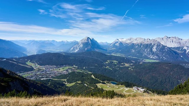 Slow panning timelapse of the mountains of the alps from Seefelder Spitze near Seefeld in Tirol, Austria