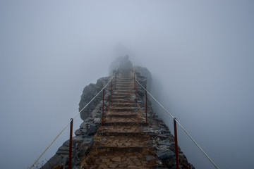 Steps disappearing in the fog