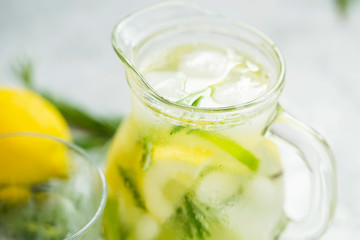 Lime and lemon mojito cocktails, fresh summer drink with ice and rosemary