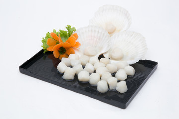 Raw scallops ready for cooking.
