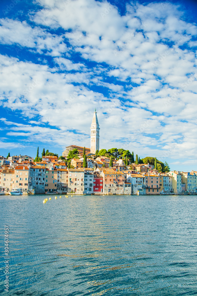 Wall mural beautiful town of rovinj on seaside in istria, croatia. old historic houses and cathedral tower bell