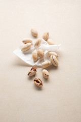 Fresh pecan nuts on stone background