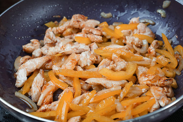 Grilled chicken breast. Grilled chicken fillet and salad of fresh vegetables from tomatoes, cucumbers and arugula leaves. Chicken meat salad. Healthy food. The apartment was lying. View from above.