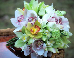 Round Bridal Bouquet of Roses and Cymbidium Orchids. Wedding Flowers. 