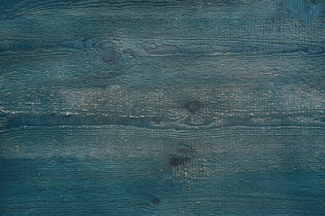 rough wood boards with traces of paint