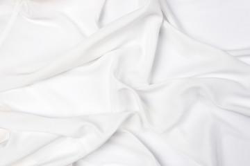 Abstract folds. Delicate silk drapery. White color.