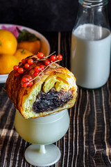 Breakfast bread, milk and fruit
