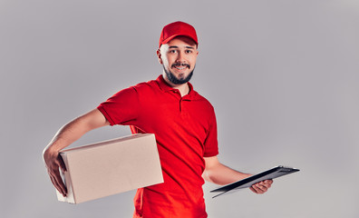 Man on gray background. Courier, Delivery Man.
