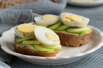 Healthy homemade sandwiches with vegetables and hard-boiled eggs