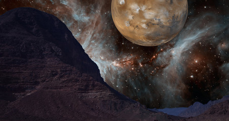 Composite image of the rocky desert in Jordan with unreal background of a star nebula and the...