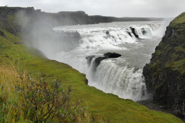 Gullfoss Waterfall, Iceland: The Gullfoss Waterfall (Golden Falls) is part of the Golden Circle Tour of Iceland from Reykjavik. Gullfoss Waterfall (Golden Falls) is a tourist attraction in Iceland.