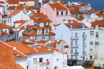 Lisbon, Portugal - May, 22nd, 2018 : Full frame of typical Alfama houses as seen from the Miradouro das Portas do Sol viewpoint.