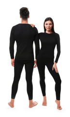 Fototapeta premium Couple wearing thermal underwear isolated on white