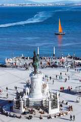 Lisbon, Portugal - May, 30th, 2018 : Statue of King José I at Commerce Square with Tagus river in...