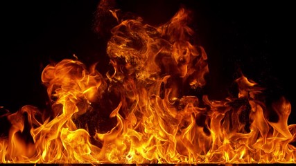 Super Slow Motion Shot of Fire Flames Isolated on Black Background at 1000fps. - Powered by Adobe
