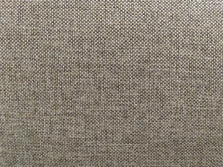 interesting monochrome fabric sewn with cotton and other materials as textile surface for furniture and other home decorations