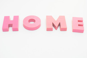 `HOME` words with letters on a white background