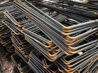 Piled iron reinforcement workpieces. Bent metal parts for reinforcement