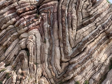Multicoloured striped rocks in Agios Pavlos Crete, Greece