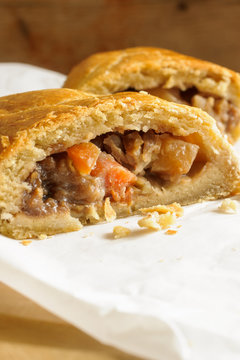 Welsh Oggie a regional delicacy from Wales of lamb leeks and vegetables baked in a short crust pastry case similar to a Cornish pasty