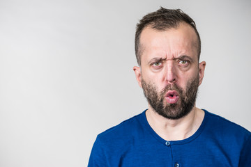 Astonished shocked adult man