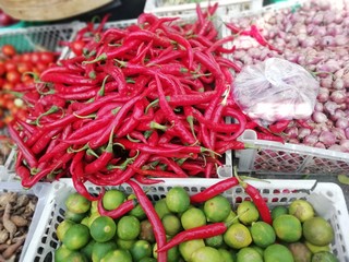 Red chili in a basket in a traditional market 
