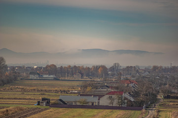 Village in the autumn afternoon in a haze